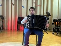 Koncert Noworoczny w PSM, na scenie uczniowie i nauczyciele PSM