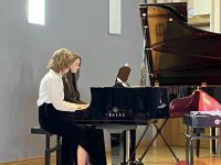 Koncert Noworoczny w PSM, na scenie uczniowie i nauczyciele PSM
