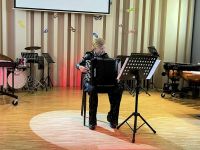 Koncert Noworoczny w PSM, na scenie uczniowie i nauczyciele PSM