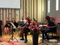 Koncert Noworoczny w PSM, na scenie uczniowie i nauczyciele PSM